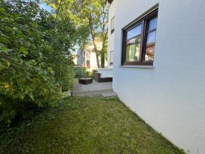 Zahrada ubytování Palmen Apartment direkt in Bad Aibling + 6 fotografií