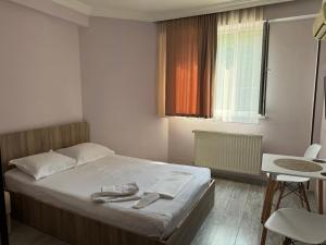 Postel nebo postele na pokoji v ubytování Hotel Skib + 37 fotografií