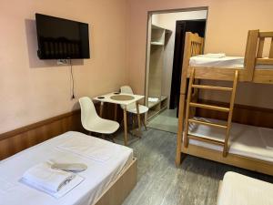 Postel nebo postele na pokoji v ubytování Hotel Skib