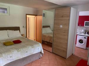 Postel nebo postele na pokoji v ubytování Apartment Roby