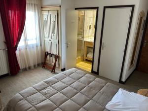 Cama o camas de una habitación en Le Bel Vue