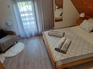 Postel nebo postele na pokoji v ubytování Apartman "SaraP" Metković