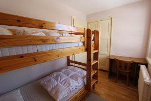 Postel nebo postele na pokoji v ubytování Chalet Les Arolles