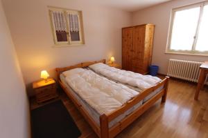 Postel nebo postele na pokoji v ubytování Chalet Les Arolles