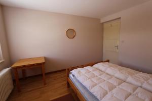 Postel nebo postele na pokoji v ubytování Chalet Les Arolles