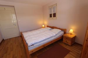 Postel nebo postele na pokoji v ubytování Chalet Les Arolles