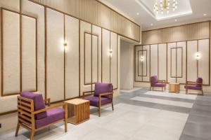 Posezení v ubytování Lilac Kumbakonam