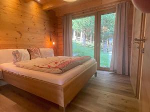 Postel nebo postele na pokoji v ubytování Chalet Traumblick