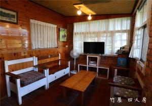 TV a/nebo společenská místnost v ubytování 玉蟾園民宿 寵物友善 YuChanYuan B&B