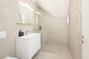 A bathroom at STAYY Flagship Limmattal - contactless check-in