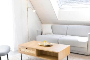 A seating area at STAYY Flagship Limmattal - contactless check-in