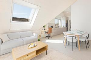 A seating area at STAYY Flagship Limmattal - contactless check-in