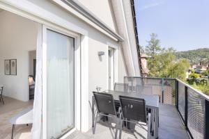 A balcony or terrace at STAYY Flagship Limmattal - contactless check-in