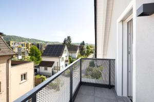 A balcony or terrace at STAYY Flagship Limmattal - contactless check-in