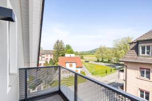 A balcony or terrace at STAYY Flagship Limmattal - contactless check-in