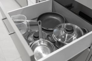 A kitchen or kitchenette at STAYY Flagship Limmattal - contactless check-in