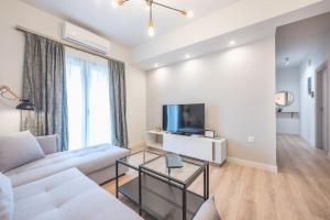TV a/nebo společenská místnost v ubytování Modern Apartment