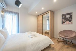 Postel nebo postele na pokoji v ubytování Modern Apartment