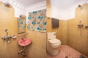 Vannituba majutusasutuses OYO 821 Hotel Gauri