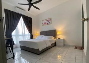 Ένα ή περισσότερα κρεβάτια σε δωμάτιο στο Lilyhouse homestay-مسلم +16 φωτογραφίες