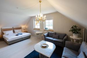 Postel nebo postele na pokoji v ubytování Rathener Hof by STEIGER Hotels