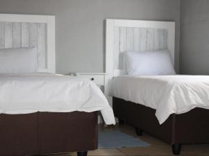 Postel nebo postele na pokoji v ubytování Barieta Beach Cottages - Self Catering