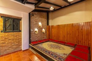 Postel nebo postele na pokoji v ubytování vajra house