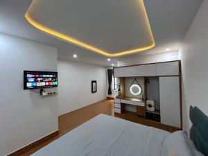 TV a/nebo společenská místnost v ubytování Oasis Homestay