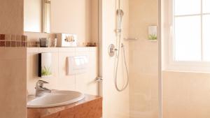 Koupelna v ubytování Hotel Villa Laurus
