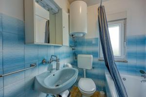 Koupelna v ubytování Apartment Basic + 49 fotografií