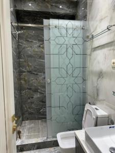 Ένα μπάνιο στο Guest House Uzbegim