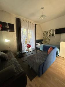 Posezení v ubytování Apartmani Trio + 28 fotografií