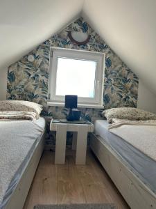 Postel nebo postele na pokoji v ubytování Apartmani Trio