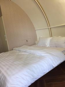 Postel nebo postele na pokoji v ubytování BING BONG HOTEL
