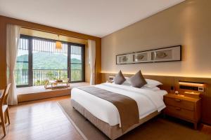 Fotografie z fotogalerie ubytování 神玉岛玉酒店 ShenYu Island Jade Hotel v destinaci Baoting
