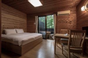 Fujiyama Inn Coniferにあるベッド
