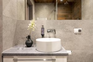 Kúpeľňa v ubytovaní Apartamenty Krupówki 20