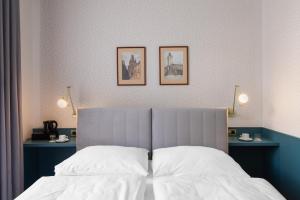 Posteľ alebo postele v izbe v ubytovaní Hotel Beránek