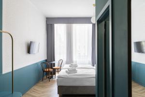 Posteľ alebo postele v izbe v ubytovaní Hotel Beránek