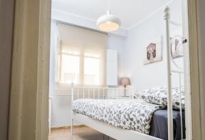 Giường trong phòng chung tại LOIRA LA VIA Encanto en Zona Residencial