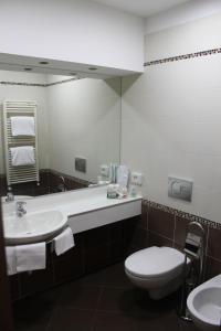 Koupelna v ubytování Hotel Continental