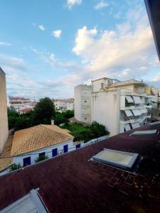 a view of a city from the roof of a building at ILiana's Luxury Apartments in Preveza
