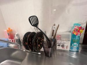 Una cocina o cocineta en 关西机场难波梅田直达花園町の夢旅人