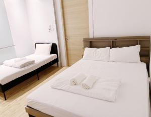 Postel nebo postele na pokoji v ubytování RadZone Hostel