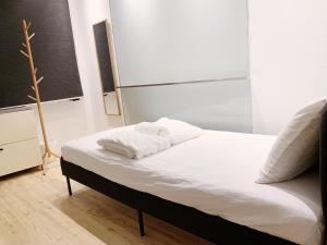 Postel nebo postele na pokoji v ubytování RadZone Hostel