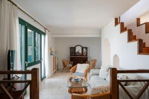 Posezení v ubytování Beachfront Oasis
