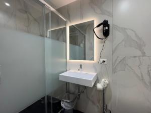 Koupelna v ubytování Hotel Philia
