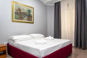 Postel nebo postele na pokoji v ubytování Hotel Philia