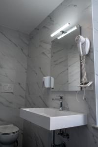 Koupelna v ubytování Hotel Philia