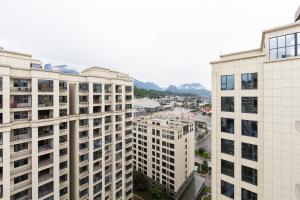 an overhead view of a city with tall buildings at Heavens Gate homestay free pick up service from train station and airport in Zhangjiajie